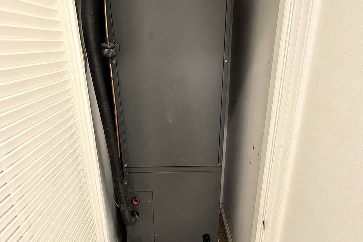 Doral home air handler closet with AC equipment